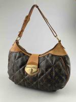 LOUIS VUITTON. SAC A MAIN "City Bag" en toile monogram...