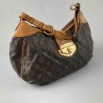 LOUIS VUITTON. SAC A MAIN "City Bag" en toile monogram...