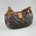 LOUIS VUITTON. SAC A MAIN "City Bag" en toile monogram...