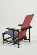 D'après Gerrit Thomas RIETVELD (1888-1964)
CHAISE "Red and Blue", créée en...