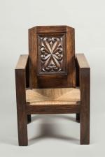 Joseph SAVINA (Douarnenez, 1901 - Tréguier, 1983).
Grand FAUTEUIL en chêne...