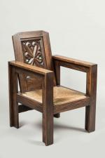 Joseph SAVINA (Douarnenez, 1901 - Tréguier, 1983).
Grand FAUTEUIL en chêne...