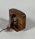 LAMPE en bois exotique, à décor de deux huîtres perlières,...