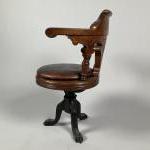 FAUTEUIL DE PAQUEBOT, pieds en fonte, assise amovible en cuir,...