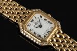 BAUME   MERCIER. MONTRE-BRACELET de dame en or jaune....