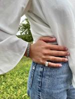 BRACELET rigide et ouvrant en or jaune et argent, le...