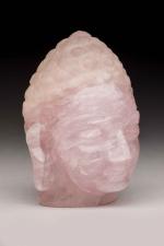 CHINE, XXème siècleTête de bouddha en quartz rose. Hauteur :...