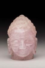 CHINE, XXème siècleTête de bouddha en quartz rose. Hauteur :...