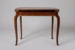 François LINKE (1855-1946). TABLE A JEU formant CONSOLE de forme...